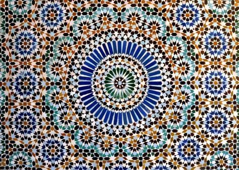 Zellige tiles, the lovely traditional Moroccan art form, used geometric shapes because Islam forbade human or animal figures Paris Mosque, Moroccan Arch, Islamic Mosaic, Art Marocain, Pattern Meaning, Mosaic Tile Art, Moroccan Culture, Moroccan Art, Moroccan Pattern