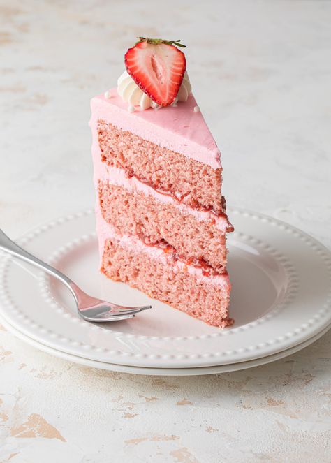 A slice of Strawberry Layer Cake with strawberry jam and pink ermine frosting on a white plate. Layered Cake Recipes, Cake With Strawberry Jam, Strawberry Layer Cake, Ermine Frosting, Strawberry Layer Cakes, Cake With Strawberry, Layer Cake Recipes, Leftover Cake, Small Food Processor