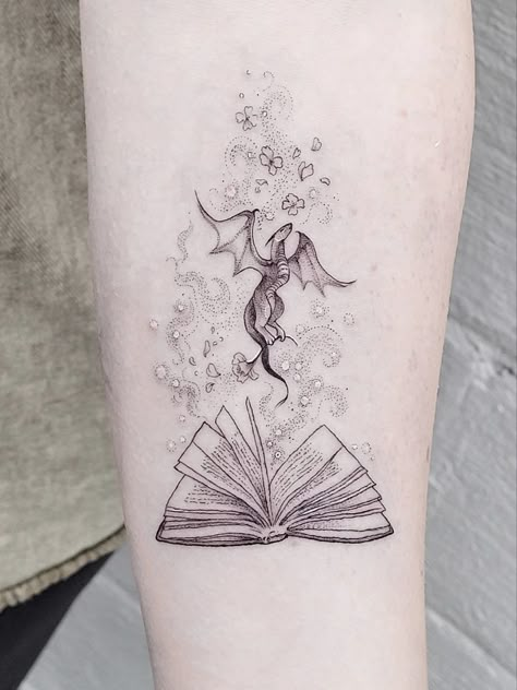 Disney Book Tattoo, Classy Thigh Tattoos For Women, Reading Tattoos For Women, Book Worm Tattoo, Ttpd Tattoos, Book Dragon Tattoo, Small Book Tattoo, Dnd Tattoo, Writer Tattoo