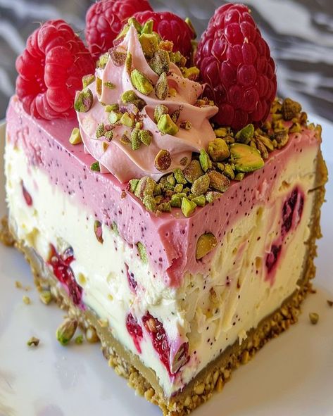 recipes tower community | Crunch Pistachio Raspberry Cheesecake | Facebook Recipes Tower, Pistachio Cheesecake Recipe, Pistachio Raspberry, Unique Sweets, Raspberry No Bake Cheesecake, Cheesecake Ingredients, Raspberry Swirl Cheesecake, Pistachio Dessert, Pistachio Cheesecake