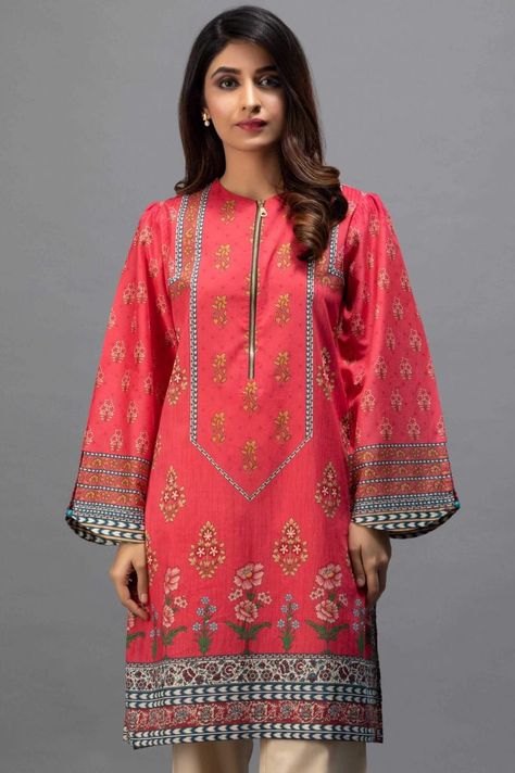 A beautiful shirt with a front zipper and beautiful digital print having marble balls for embellishment by Zeen eid collection 2019 is a must have eid kurti Shirts Design For Girls Pakistani, Ladies Kurti Design, Shirt Design For Girls, Latest Dress Design, Stylish Short Dresses, Long Kurti Designs, Pakistani Dresses Casual, Pakistani Fashion Party Wear, Dress Neck Designs