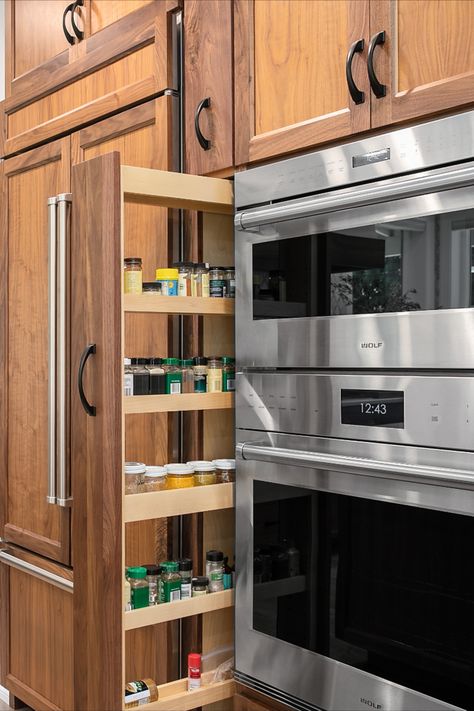 A pull-out spice rack offers storage in a small space between the paneled fridge and the double wall ovens. Paneled Fridge, Double Wall Ovens, Pull Out Spice Rack, Whole House Remodel, Wall Ovens, Kitchen Built In, Kitchen Bathroom Remodel, Fantasy House, Spice Rack