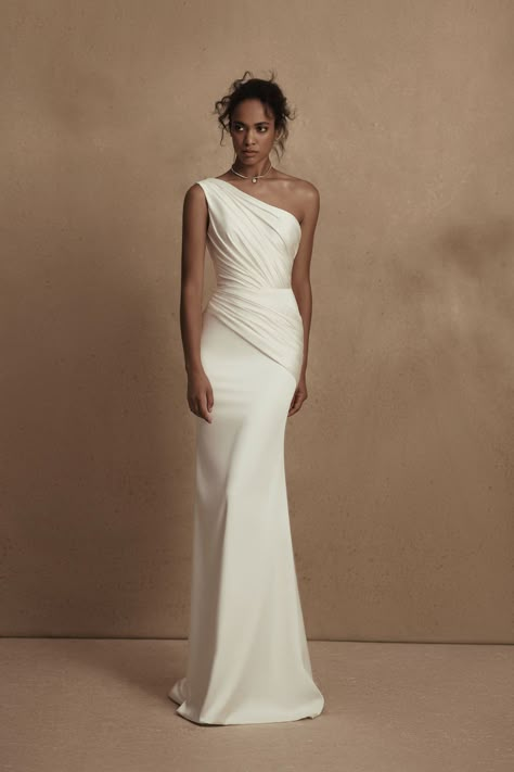 Simple sheath wedding dress with modern one shoulder neckline and wrap bodiceSatin bridal gownWONAConcept Wedding Dresses 2023Personality Bridal CollectionRueBelle The MagazineSee more gorgeous bridal gowns and find your dream wedding dress by clicking on the photo Simple Elegant Wedding Dress, Elegant Wedding Gown, Minimal Wedding Dress, Dream Wedding Ideas Dresses, Fitted Wedding Dress, Dresses 2023, Gala Dresses, Elegant Wedding Dress, Dress Inspo