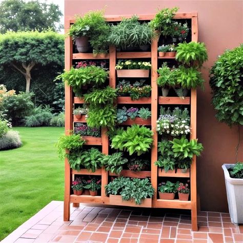 40 Vertical Garden Ideas for Indoor and Outdoor Spaces Vertical Herb Garden Ideas, Back Porch Gardening Ideas, Vertical Plant Wall Outdoor, Vertical Garden Diy Outdoor, Vertical Garden Wall Outdoors, Vertical Patio Garden, Herb Planters Outdoor, Hanging Planters Outdoor, Vertical Plant Wall