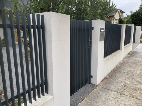 White House Gray Roof, Fence Side Of House, Rendered Fence, Batten Fence, Iron Fence Gate, Aluminium Fence, Gate Designs Modern, Fence Gate Design, House Main Gates Design