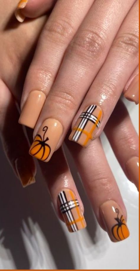 Elevate your nail game this fall with our exquisite Fall Pumpkin Nails collection! Embrace the cozy vibes of the season by sporting charming pumpkin designs and rich autumnal colors that capture fall's essence perfectly. Whether you fancy chic pumpkin art or classic orange shades, we've got a variety of options to help you achieve a manicure as stylish as a hayride through the pumpkin patch. Fall Nails 2024 Pumpkin, Pumpkins Nails Design, French Tip Fall Nails Square, Pumpkin Design Nails, Short Pumpkin Nails, Pumpkin Gel Nails, Thanksgiving Themed Nails, Square Nail Designs Fall, Fall October Nails