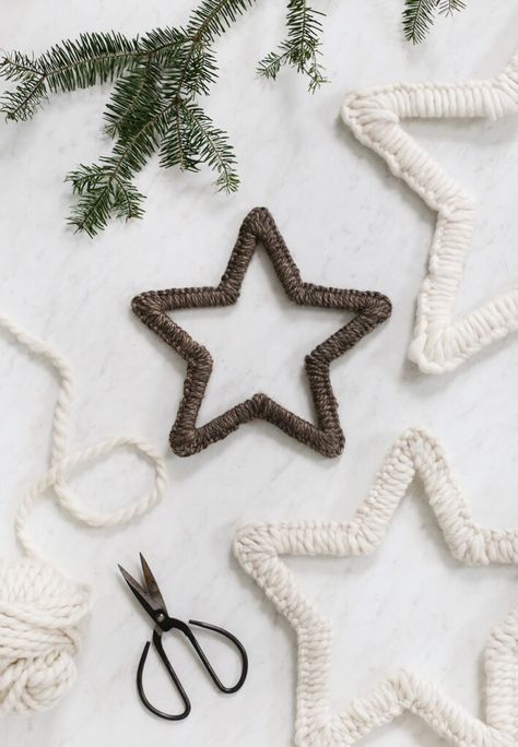 Make these cozy yarn stars to add some warmth and texture to your holiday decor! #holidaydecor #christmas Yarn Stars Ornament, Easy Knitted Christmas Decorations, Easy Diy Yarn Ornaments, Yarn Star Ornaments Diy, Yarn Wrapped Stars, Diy Star Ornaments Homemade Christmas, Chunky Yarn Christmas Trees, Yarn Stars Diy, Christmas Yarn Diy