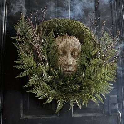 Put visitors face-to-face with the mysteries of the natural world. The spirit embodied by our Forest Face Wreath isn animated, doesn speak or make noise, but leaves guests wondering what might happen next. Highly detailed resin face is designed to look like wood grain nestled among faux fern, succulent, and twig accents, along with real moss, for a subtle startle to the unsuspecting. Quality materials look fresh every year Genuine moss, expect natural shedding Wired grapevine base Imported A G Glam Wreath, Berry Wreaths, Resin Face, Celestial Crystal, Dog Skeleton, Gothic Glam, Wreath Halloween, Halloween Wreaths, Grandin Road