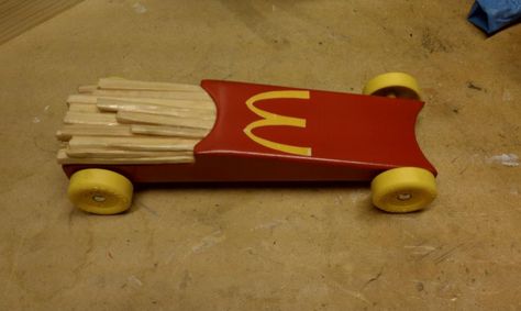 McDonald's French Fry Pinewood Derby Car Pinewood Derby Car Designs, Pine Wood Derby Cars Designs Girl, Fast Pinewood Derby Cars, Fast Pinewood Derby Cars Design, Pine Wood Derby Cars Designs, Fastest Pinewood Derby Car, Derby Ideas, Pinewood Derby Cars, Cars Birthday Party Disney