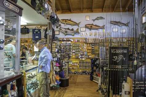 MustDo.com | Fishing enthusiasts on Sanibel will find everything they need at Whitney’s Bait and Tackle, from bespoke rods and hand-tied flies to guided fishing charters. Photo by Jennifer Brinkman. Bait And Tackle Shop, Captiva Island Florida, Camp Store, Bait Shop, Florida Fishing, Best Fishing Rods, Sanibel Island Florida, Fishing Store, Tackle Shop