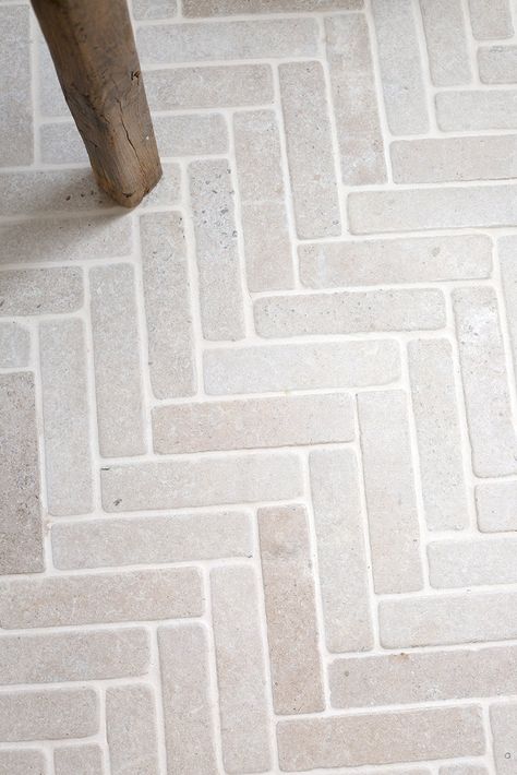 Mudroom Herringbone Floor, Limestone Herringbone Floor, Herringbone Tile Kitchen Floor, Vertical Subway Tile Shower Ideas, Utility Room Flooring, Herringbone Brick Fireplace, Herringbone Paving, Herringbone Pavers, Herringbone Patio