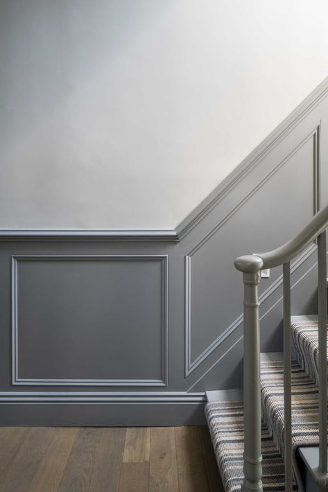 A staircase was updated with grey panelling and new carpet. Chicago Two Flat, Wall Moulding Designs, Grey Panelling, Terrace Hallway, Hallway Wall Colors, Stairs Floating, Staircase Paneling, Stairs Steel, Stairs Concrete