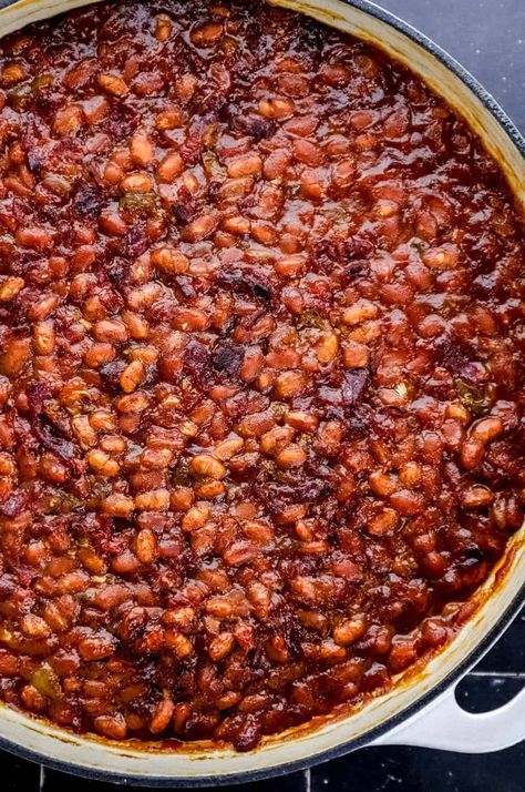 Southern Baked Beans are the perfect side dish recipe made with simple ingredients including canned beans, bacon, and a sweet and savory sauce. The best southern style recipe to share at family gatherings. simplylakita.com #bakedbeans Best Baked Beans With Bacon, Baked Beans For Bbq, Gourmet Baked Beans, Best Homemade Baked Beans, Barbeque Baked Beans, Southern Style Baked Beans With Bacon, Sweet And Spicy Baked Beans, Recipes Using Canned Ranch Style Beans, Hillbilly Baked Beans