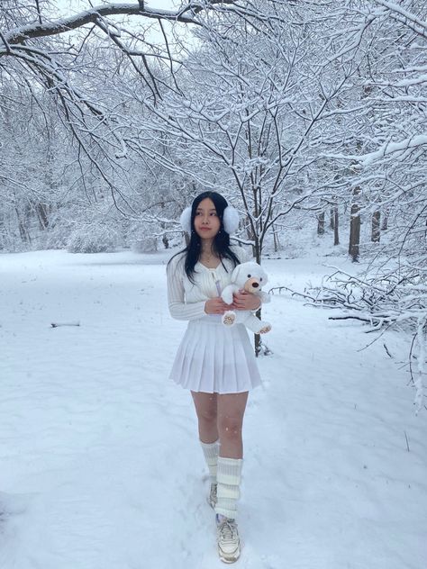 white cardigan, white leg warmers, white skirt, snow, white ear muffs, white sneakers insta: @/moondews White Aesthetic Winter Outfit, White Cardigan And Skirt Outfit, White Christmas Clothes, White Goth Winter Outfit, White Winter Aesthetic Outfit, Leg Warmers Outfit With Skirt, White Winter Skirt Outfit, White Christmas Ootd, White Tennis Skirt Outfit Winter