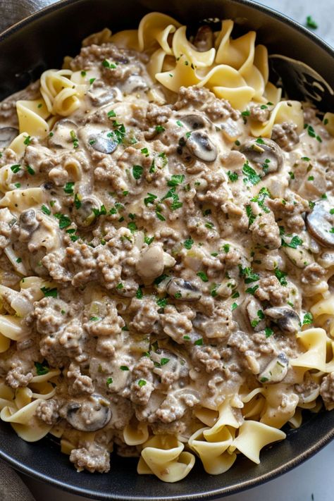 Ground Beef Stroganoff recipe, an easy, creamy dinner option. This homemade favorite, with mushrooms and cream of mushroom, is ideal for keto diets. Cook in a crockpot, instant pot, or any cookware for a simple, healthy entrée. Enjoy this scratch-made Ground Beef Stroganoff recipe at simplycalledfood.com and check other dishes with ground beef. Swedish Ground Beef Recipes, Ground Beef Stroganoff Recipe Easy Cream Of Mushroom, Gr Beef Stroganoff, Hamburger Meat And Mushrooms Recipes, Beef Stroganoff With Ground Beef Easy, Ground Beef With Mushrooms, Ground Beef With Cream Cheese, Ground Beef Stroganoff With Cream Cheese, Beef Stroganoff Crockpot Ground Beef