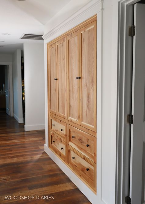 Learn how to turn a basic closet into custom built ins with this tutorial. Make your storage functional with hallway closet built ins. Built In For Closets, Hallway Laundry Closet Storage, Hallway With Closets, Closed Hallway Storage, Hall Closet Cabinet Ideas, Built In Cabinet Closet, Turn Closet Into Built In Pantry, Hall Closets Ideas Hallways, Linen Closet Hallway Built In