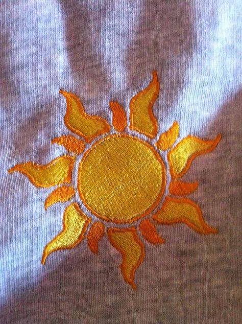 Embroidery Sun Designs, Embroidery Disney Designs, Disney Embroidery Ideas, Sun Embroidery Design, Sun Embroidery Pattern, Rapunzel Embroidery, Kawaii Embroidery, Rapunzel Sun, Distressed Tshirt Diy