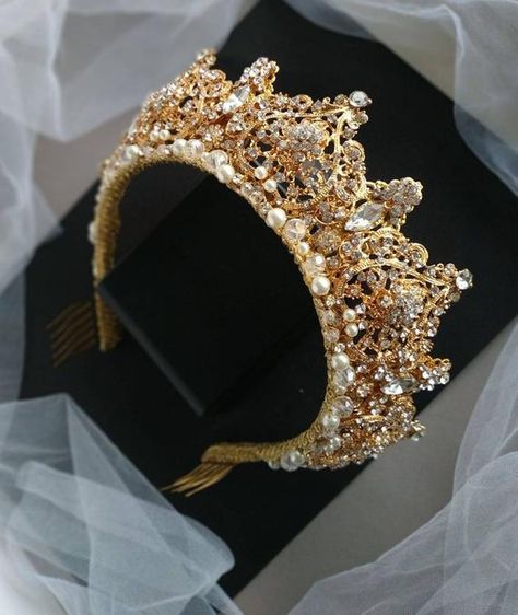 This pearl gold tiara has a luxurious gold color and excellent shine. Tiara is made of the finest materials: crystal beads, pearl beads, rhinestones, metal elements and gold wire. In the photo a crown in decoration: gold + ivory pearls. Crown height in center: Approx. 2.35 (6 cm). Length of Pearls Crown, Gold Tiara Wedding, Gold Crown Wedding, Pearl Tiara Wedding, Gold Bridal Tiara, Bridal Crown Crystal, Gold Bridal Crowns, Swarovski Tiara, Tiara Gold