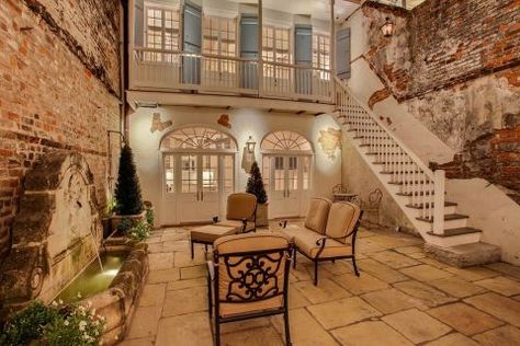 This Creole townhouse was built in 1830 and mixes French and Caribbean architectural elements. Our favorite feature? The stunning courtyard. View the listing on Zillow. French Colonial Homes, New Orleans Style Homes, Nola Style, French Colonial Style, New Orleans Decor, Creole Cottage, Modern Courtyard, New Orleans Style, French Style Homes