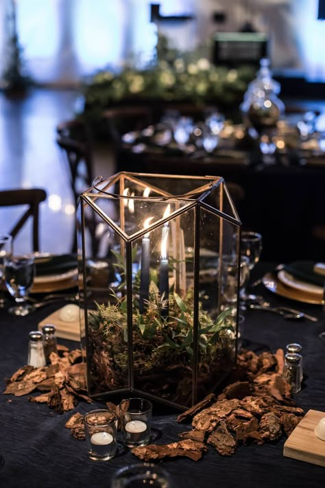 This elegant, enchanted forest wedding has the magical vibes you need LGBTQ+ weddings moody romantic two grooms gay wedding tuxedos woods candle votives centerpiece Twilight Centerpieces, Goth Wedding Centerpieces Diy, Black Enchanted Forest Wedding, Dark Forest Wedding Centerpieces, Forest Night Wedding, Witchy Centerpieces Wedding, Dark Whimsical Wedding Theme, Dark Enchanted Forest Quinceanera, Wedding Ideas Woods Forest