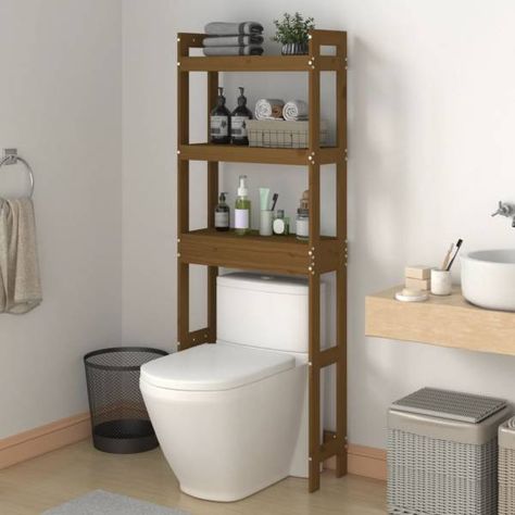 Toilet Rack Honey Brown 63x26x171 cm Solid Wood Pine https://hipomarket.co.uk/towel-racks-holders/108115-toilet-rack-honey-brown-63x26x171-cm-solid-wood-pine-8720845683795.html Maximise the space in your bathroom while adding stylish looks with this wooden toilet rack! Solid pine wood: Solid pine wood is a beautiful natural material. Pine wood has a straight grain, and the knots give the material its signature, rustic look.Bathroom space saver: The storage shelf utilises the unused sp... Wooden Bathroom Shelves, Freestanding Bathroom Shelves, Dream Kitchen Layout, Over Toilet Storage, Toilet Room Decor, Bathroom Space Saver, Towel Racks & Holders, Toilet Shelves, Bath Shelf