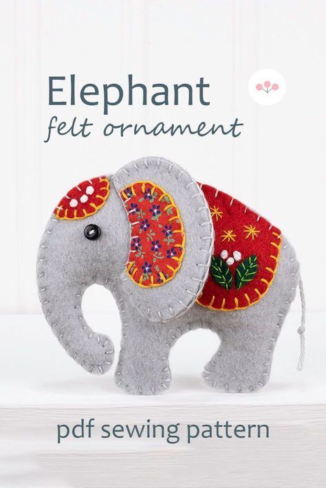 Sew your own Ella the Elephant, an embroidered felt elephant ornament.Ella measures 8cm / 3.5 inches high and has a cotton loop for hanging.The pattern includes detailed instructions and step by step photos, with actual size templates.All the stitching is done by hand - you don't need a sewing machine.#feltornaments #handmadechristmasornaments Felt Applique Ideas, Christmas Ornament Sewing, Sewing Patterns Christmas, Felt Elephant, Diy Felt Christmas Ornaments, Felt Animal Patterns, Baby Mobil, Felt Ornaments Patterns, Felt Crafts Patterns