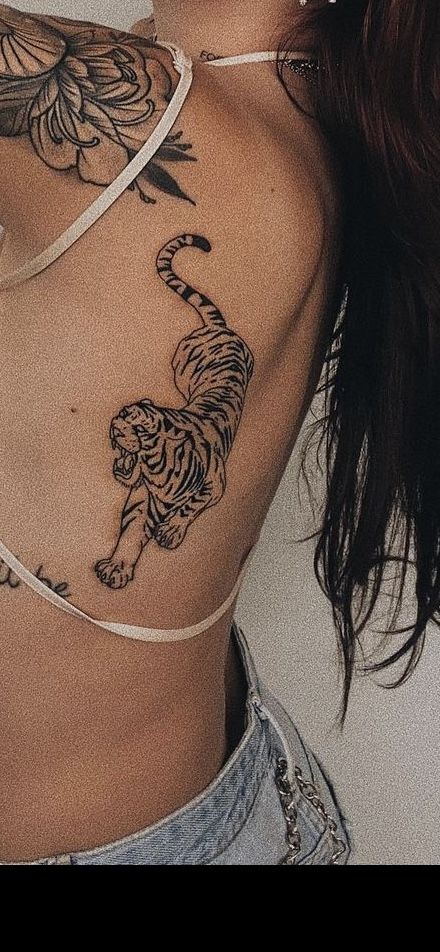 Tiger On Back Tattoo For Women, Tiger Tattoo Shoulder For Women, Tiger Tattoo On Rib Cage, Women’s Tiger Tattoo, Tiger Tattoo Forearm Women, Tigress Tattoo For Women, Lepord Tattoo Idea, Lioness Roaring Tattoo, Jungle Tattoo Sleeve Women