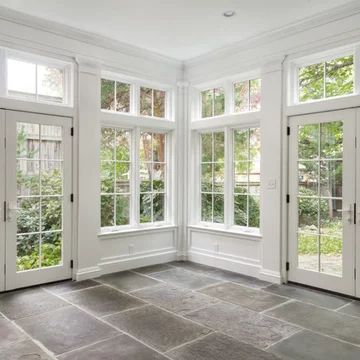 Glassed In Porches, Four Seasons Room Addition, Cottage Sunroom, Enclosed Patio Ideas, Glass Sunroom, Townhouse Renovation, Sunroom Windows, Sunroom Dining, Small Sunroom