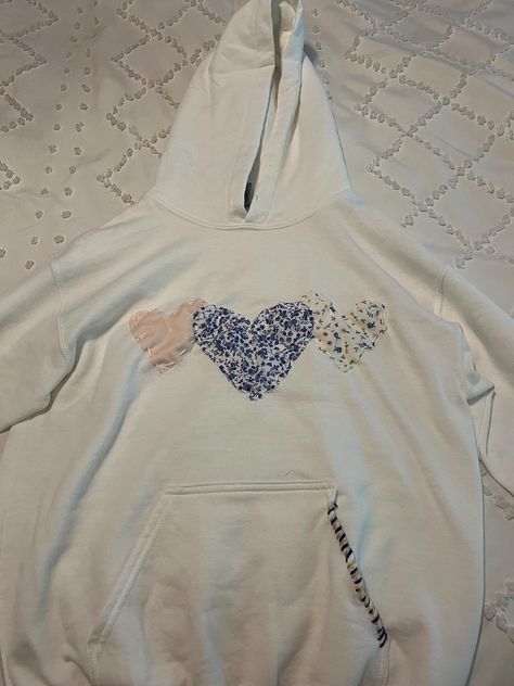 Heart Sewn Hoodie | This sweatshirt comes with multiple, customizable colors and fabrics and is sewn by hand. Because each sweatshirt is handmade, no two sweatshirts are alike. Custom stitching is also chosen by designer to match fabric. Stitch Work Hoodie, Fabric Sweatshirt Design, How Lucky Are We Sweatshirt, Hoodies With Embroidery, Embroidered Heart Sweatshirt, Heart Patch Hoodie, How Lucky Are We Hoodie, Heart Stitch Hoodie, Heart Sweatshirt Diy