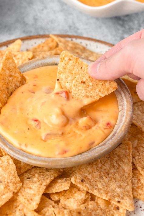 This creamy and delicious Velveeta Cheese Dip is made with just 3 simple ingredients! Perfect for game day, parties, or a quick snack, it's the ultimate cheesy dip to pair with tortilla chips or veggies. Ready in minutes! Velveeta Cheese Dip Recipes, Queso Dip Easy, Velveeta Dip, Melted Cheese Dip, Cheese Chip Dip, Velveeta Cheese Dip, Recipes With Velveeta Cheese, Cheesy Chips, Cheese Dip Mexican