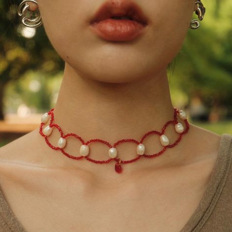 《Scarlet Crown》"This necklace is crafted with red 2mm glass beads, adorned with irregular pearls ranging from 6-8mm, and features a 9mm red teardrop-shaped glass pendant." Size：The necklace length is approximately 14 inches, and the ribbon length is 28 inches. ‼️ Important Information Before Purchase: Please note that all natural products (such as pearls, shells, crystals, etc.) come in varied shapes and may exhibit irregularities or natural cracks. No two necklaces or earrings are identical; kindly make your purchase with caution. 📿To ensure the longevity of your jewelry, please refrain from wearing them while bathing, swimming, in saunas, during physical activities, and avoid exposure to high temperatures or alcohol. Red Pearl Chain Necklace For Party, Red Pearl Necklace With Pearl Charm As Gift, Handmade Adjustable Red Pearl Necklace, Red Pearl Necklace With Charm As Gift, Red Pearl Necklaces For Valentine's Day, Adjustable Handmade Red Pearl Necklace, Adjustable Red Pearl Necklace Gift, Red Pearl Beaded Chain Jewelry, Adjustable Red Jewelry With Pearl Charm