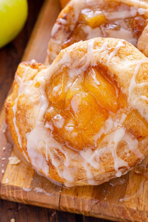 This Apple Danish recipe offers two options for making danishes - with crescent rolls or puff pastry with cream cheese. Both result in an irresistible dessert with apple pie filling and a sweet glaze on top. Caramel Apple Danish, Apple Breakfast Pastries, Apple And Cream Cheese Danish, Apple Pie Danish Recipe, Apple Cream Cheese Puff Pastry, Apple Danish Recipe Puff Pastry, Dessert With Apple Pie Filling, Fruit Danish Recipe, Puff Pastry With Cream Cheese