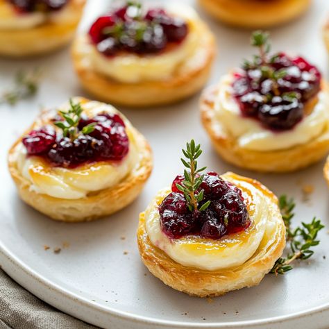 Easy Cranberry Brie Bites - Krystel's Cooking Cranberry Brie Bites With Orange Marmalade, Three Ingredient Cranberry Brie Bites, Christmas Auderves, Cranberry Phyllo Brie, Thanksgiving Phyllo Appetizers, Tiny Bites Appetizers, Easy Cranberry Brie Bites, 3 Ingredient Cranberry Brie Bites, Brie Appetizer Thanksgiving