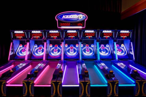 Skee ball Machines with Neon Lights. This is one of Dave Skee Ball Diy Plans, Ski Ball, Light Pink Bedrooms, Indoor Pool Design, Dave & Busters, Skee Ball, Maximalist Style, Pink Bedrooms, Home Theater Rooms