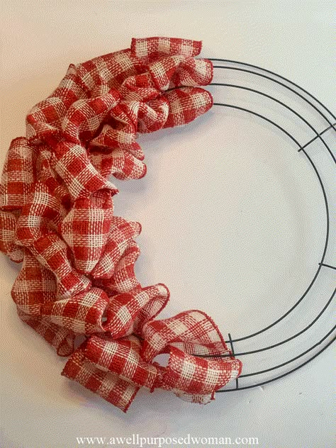 Learn how to make a ribbon wreath with this step by step tutorial. Anyone can learn how to make a ribbon wreath in just a few minutes. Add a beautiful ribbon wreath to your front door or an old window inside your home. #howtomakearibbonwreath #ribbonwreath #diywreath #farmhousewreath #diyfourthofjulywreath #burlapwreath #diyburlapwreath #valentinesdaywreath Make A Ribbon Wreath, Ribbon Wreath Tutorial, Christmas Wreaths For Windows, Burlap Ribbon Wreaths, Ribbon Wreath Diy, Burlap Wreath Tutorial, Mesh Wreaths Diy, Mesh Ribbon Wreaths, Deco Mesh Wreaths Tutorials