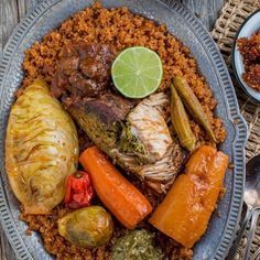 Read on to learn how to cook Senegalese thieboudienne with our step-by-step recipe guide. Thieboudienne aka chebu jen is a traditional dish from Senegal. Senegalese Food, African Meals, Fish Marinade, Meal Planning Menus, Jollof Rice, Smoked Fish, Food Chicken, Stuffed Sweet Peppers, African Food