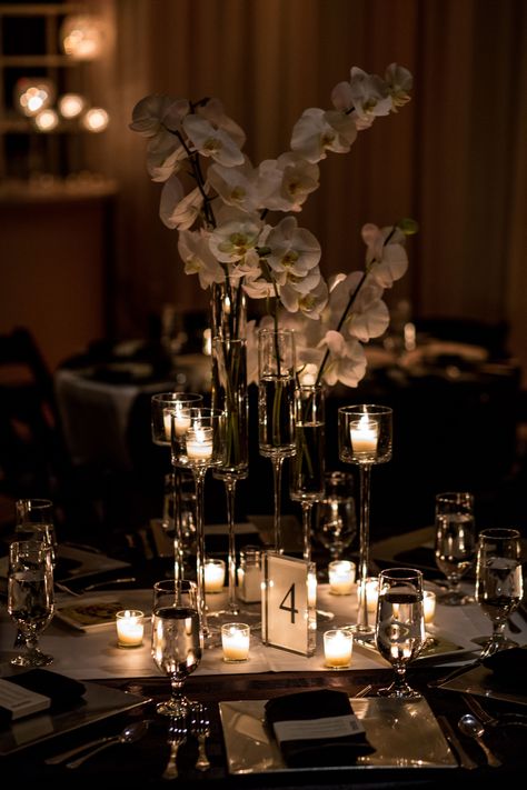 Single Stem Orchid Centerpiece, Orchid Wedding Table Centerpieces, Orchid Floral Arrangements Wedding Ideas, Orchid Plant Centerpiece Wedding, Black Tie Wedding Centerpieces, Candle And Flower Centerpieces Wedding, Wedding Centerpieces Black, Classy Centerpieces, Orchid Wedding Decor