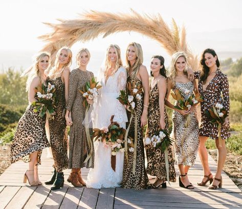 We love these leopard print bridesmaids dresses! #bridesmaids #leopardprint #bridesmaiddresses Cheetah Print Wedding, Safari Wedding Theme, Leopard Print Wedding, Leopard Wedding, Printed Bridesmaid Dresses, Wedding Invitations With Rsvp, Safari Wedding, Neutral Bridesmaid Dresses, Bridesmaid Groomsmen