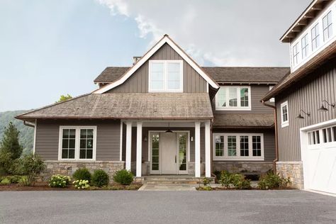 10 House Colors That Go With Brown Roofs | Hunker Cottage House Exteriors, Condo Paint Colors, Hardie Siding Colors, James Hardie Siding Colors, Exterior House Paint Colors, Riverfront Home, Brown Roofs, Chango & Co, Exterior Gray Paint