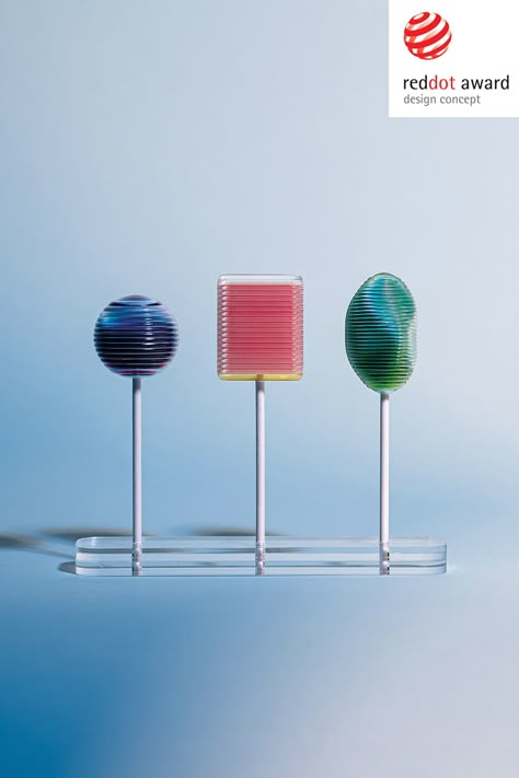 Playful Product Design, Speculative Design Products, Interactive Product Design, Olipop Branding, Tactile Exhibition, Toys Exhibition Design, Miel Pops, Lollipop Design, Product Rendering