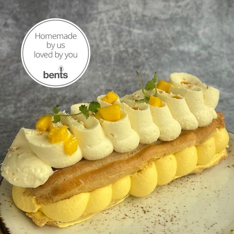 Our dessert of the month for July is Mango cream éclair 🍰 - Choux pastry éclair filled with a mango flavoured mascarpone cream and topped with a whipped white chocolate ganache. Finished with fresh mango chunks, micro lemon balm, mango coulis and toasted coconut 💛 Mango Eclair, Eclair Recipes, Whipped White Chocolate Ganache, Mango Coulis, Eclair Cream, Eclair Recipe, Mango Cream, Mascarpone Cream, Mango Chunks