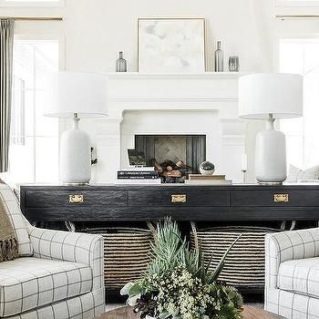 Built In Storage Bench Next to Fireplace - Cottage - Living Room Chairs Behind Sofa, Bench Next To Fireplace, Lamps Behind Sofa, Built In Storage Bench, Off White Couch, Plank Coffee Table, Black Sofa Table, Black Wainscoting, Table Behind Couch