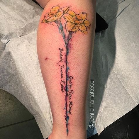 Abstract watercolor daffodil tattoo with the names of loved ones. Tattoo by Ryan Tews. #daffodil #flower #abstract #watercolor #names #RyanTews Daffodil Tattoo With Name, Daffodil Tattoo Ideas, Watercolor Names, Daffodil Watercolor, Heart Tattoos With Names, Daffodil Tattoo, Abstract Tattoo Designs, Circle Tattoos, Full Sleeve Tattoo Design