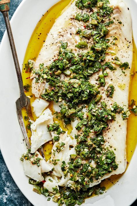 Tender, flakey oven-roasted cod is enveloped in a bold, herby, and bright olive tapenade. Oven Roasted Cod, Sirt Recipes, Autumnal Dinner, Oven Baked Cod, Italian Thanksgiving, Olive Tapenade Recipe, Tapenade Recipe, Glass Of White Wine, Roasted Cod