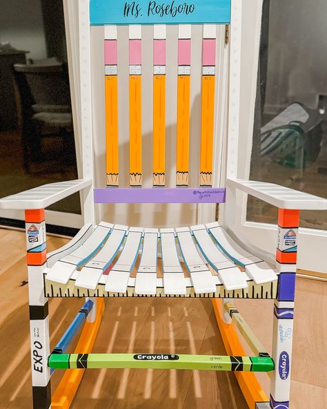 Got to paint another rocking chair this week! Super fun and loved working with this customer! I hope her daughter likes this chair for her new classroom as much as I enjoyed painting it! 🎨🪑🖌️🧑🏻‍🎨 https://theartistnextdoornc.etsy.com/listing/1684037716 #Theartistnextdoor #watercolor #momswhopaint #creatormom #watercolorist #paintmakeseverythingbetter #classroomcbair #sharechair #elementaryteacher #art #paintedfurniture #diy #upcycling #raleigh #theartistnextdoornc #etsyshop #etsysellersofins... Teacher Rocking Chair Painted Diy, Teacher Rocking Chair Painted, Classroom Rocking Chair, Teacher Rocking Chair, Teacher Rocking Chairs, Teacher Stools, Share Chair, Teacher Chair, Teacher Chairs