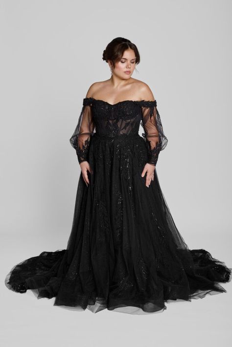 Black wedding dresses make a bold and beautiful statement, offering an unforgettable twist on traditional bridal fashion. For the bride who dares to embrace her individuality, these gowns blend timeless elegance with a touch of mystery. From intricate lace details to dramatic silhouettes, this guide explores the allure of black wedding dresses that cater to diverse styles and body types. | black wedding dresses | unique wedding dresses | #wedding #bride #dress