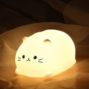 "Cat Night Light with long-life battery and soft silicone material. Soft brightness and 7 color changes. Adorable whale design. Perfect for kids' bedrooms."#CatNightLight #KidsNightLight #NurseryLamp #LEDNightLight #SoftBrightness #BreathingColor #BabyNightLight #WhaleDesign #BedtimeEase #DiaperChanging #Breastfeeding #AdorableDesign Cat Nursery, Cat Night, Cat Lead, Cat Lamp, Gatto Carino, Cute Night Lights, Cat Light, Nursery Lighting, Baby Night Light