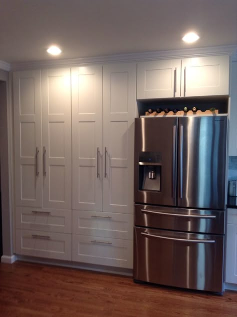 Double white ikea pantry. Samsung stainless steel French door refrigerator with dual zone drawer. Wine rack above fridge Ikea Kitchen Pantry, Motivation Artwork, White Kitchen Pantry Cabinet, Lighting Stairs, White Kitchen Pantry, Ikea Pantry, Stainless Steel Kitchen Cabinets, Steel Kitchen Cabinets, Ikea Kitchens