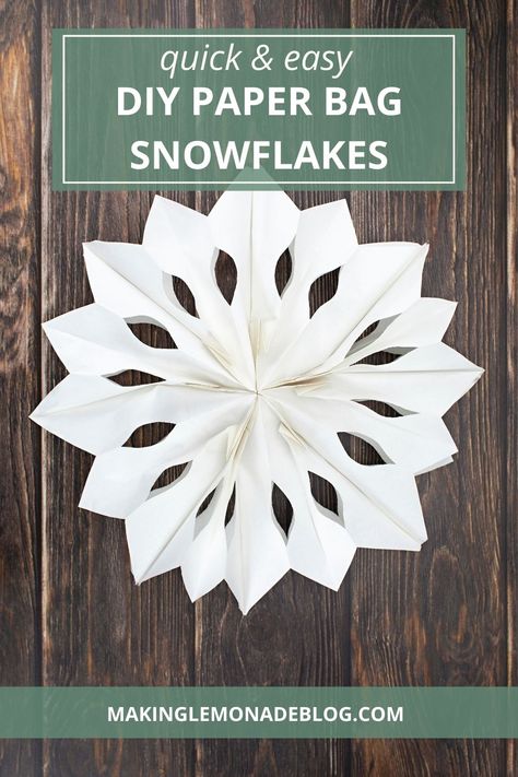 This easy Christmas craft is a real showstopper. Make gorgeous snowflakes out of paper bags and create a winter wonderland in your home! (once you start, it's hard to stop-- they're pretty AND fun to make!) Lunch Bag Snowflakes, Invisible Christmas Tree, Bag Snowflakes, Christmas Frames Diy, Making Paper Snowflakes, Toy Organization Ideas, Wallpaper Accent Walls, Wall Display Ideas, Mantle Decorating Ideas