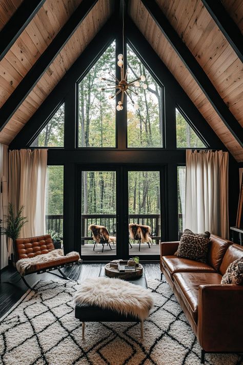 Mountain Airbnb Interior, A Frame Window Wall, Black Cabin Interior Design, Cabin Before And After, A Frame Windows Living Room, Cozy A Frame Cabin Interior, A Frame Curtains, Painting Log Cabin Walls, Modern Alpine Cabin